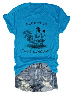 Detailed view of sky blue t-shirt with rooster print and fowl language typography