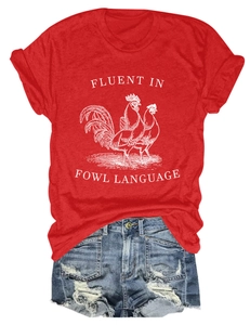 Close-up of red cotton t-shirt with rooster print and distressed denim shorts set