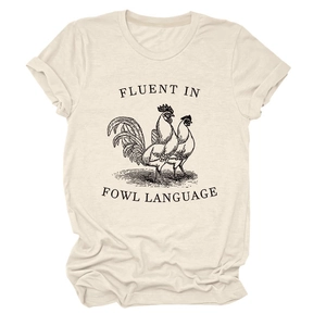 Detail of oatmeal crewneck t-shirt featuring a fluent in fowl language rooster sketch