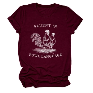 Close-up of rooster graphic and Fluent in Fowl Language text on burgundy cotton t-shirt