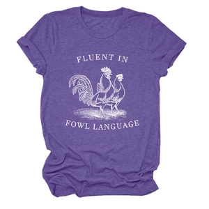 Close-up of the vintage rooster print and white text on this purple cotton t-shirt