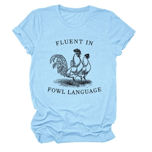 Close-up of light blue cotton T-shirt featuring Fluent in Fowl Language rooster print