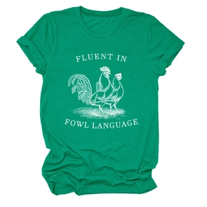 Detail of green cotton t-shirt featuring Fluent in Fowl Language rooster graphic print