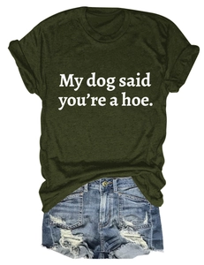 Detail of olive green t-shirt with slogan and distressed denim shorts flat lay