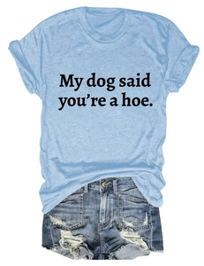 Detail of casual light blue graphic tee with humor slogan and ripped denim shorts set