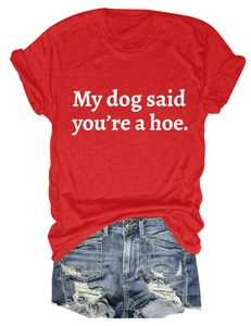 Flat lay of red cotton T-shirt with My Dog Said text and blue ripped denim shorts