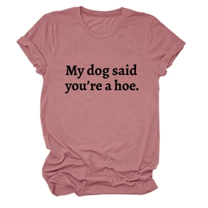 Detail view of cotton pink t-shirt with black My dog said you're a hoe slogan print