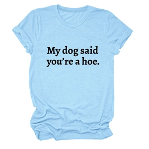Flat lay of light blue cotton t-shirt featuring black 'My dog said you're a hoe' slogan