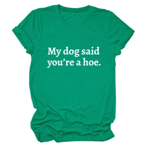 Detail of green cotton T-shirt featuring My dog said you're a hoe white graphic text