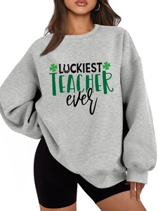 Detail of grey sweatshirt showing fleece texture and Luckiest Teacher Ever text print