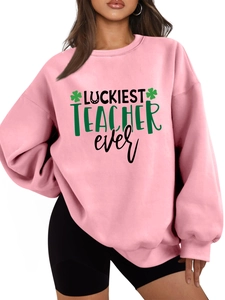 Detail of St. Patrick's Day teacher sweatshirt in pale pink with clover graphics