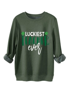 Detail of soft gray fleece lining on a dark green Luckiest Teacher Ever sweatshirt