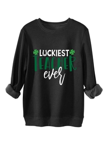 Detail of St. Patrick's Day graphic print on black fleece sweatshirt for teachers