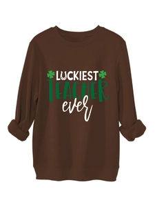 Detail of Luckiest Teacher Ever print with green clover and horseshoe on sweatshirt