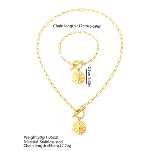Detail of stainless steel necklace and bracelet set with toggle clasp and star pendant