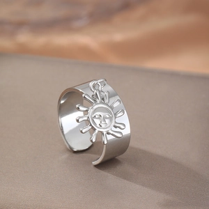 Adjustable silver stainless steel ring featuring a creative bohemian sun face pendant