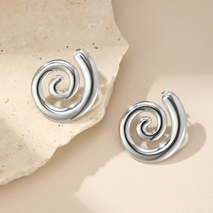 Polished silver spiral stainless steel drop earrings in a minimalist modern style
