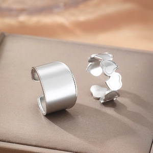 Double-layered 18k gold stainless steel rings with smooth band and hollow heart pattern