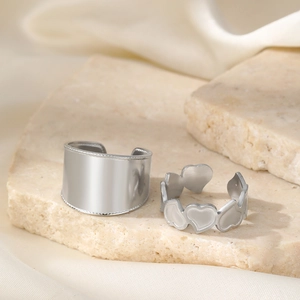 Silver-colored 18k stainless steel ring set with heart patterns and double-layer thread