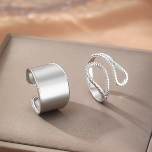 Minimalist silver open rings set with polished wide band and twisted rope texture