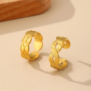 Vintage gold adjustable rings with geometric hollow and braided rope texture on leather