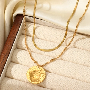 Bohemian gold double layer necklace with herringbone chain and hammered coin pendant
