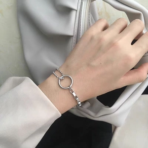 Minimalist silver stainless steel bracelet featuring mixed bead and box chain with large ring