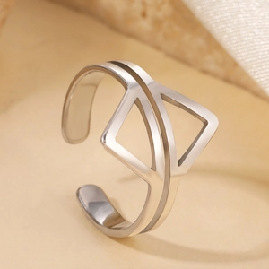Polished stainless steel open ring with overlapping geometric triangles in a punk style