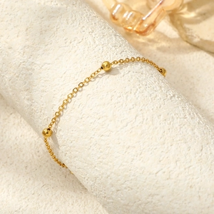 Exotic vintage layered tassel foot chain with gold metal beads and elegant chain links