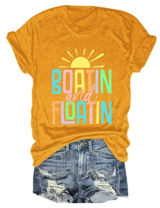 Flat lay of women's casual yellow short sleeve T-shirt with Boatin and Floatin print