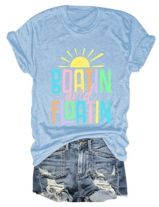 Detail of Boatin and Floatin sky blue t-shirt and distressed denim shorts with fringe