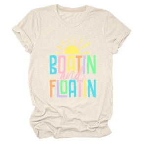 Detail of Boatin' and Floatin' colorful print on cream short sleeve cotton t-shirt