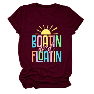 Close-up of wine red crew neck t-shirt with colorful Boatin and Floatin sun print