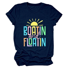 Detail of navy blue t-shirt with Boatin and Floatin print and sun graphic design