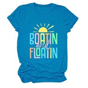 Close-up of Boatin and Floatin letter print on soft bright blue cotton T-shirt fabric