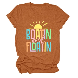 Detail of burnt orange t-shirt showing Boatin and Floatin print and cotton texture