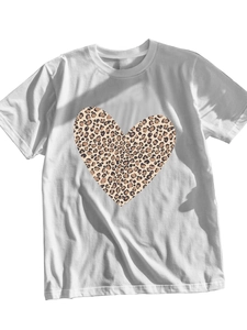 Close-up of white cotton T-shirt featuring a leopard print heart design and crew neckline
