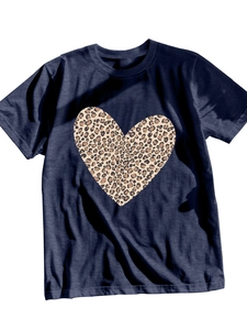 Detail of navy crewneck T-shirt featuring a large leopard print heart pattern on cotton fabric
