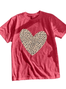Detail of red crewneck t-shirt featuring a large leopard print heart pattern on cotton fabric