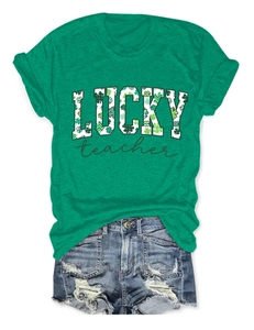 Detail of green Lucky Teacher T-shirt with shamrock pattern for St. Patrick's Day