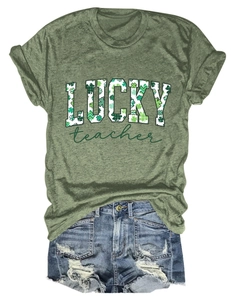 Detail of army green crew neck tee with LUCKY teacher clover print and denim shorts
