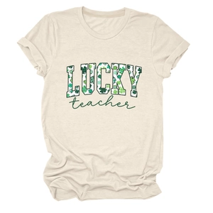 Close-up detail of Lucky Teacher St. Patrick's Day print on cream crew neck tee