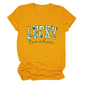 Close-up of vibrant yellow cotton T-shirt with LUCKY teacher clover print detail