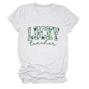 Detailed flat lay of white cotton T-shirt featuring green Lucky Teacher graphic print