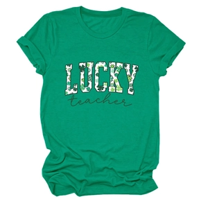 Detail of cotton crewneck tee featuring Lucky Teacher print with green clover patterns