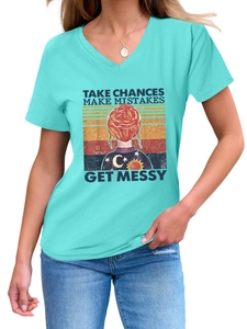 Close-up of V-neck cotton T-shirt with colorful Take Chances Make Mistakes graphic