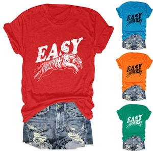 Detail of colorful tiger print T-shirts in red blue and orange with EASY text design