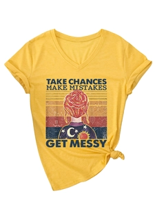 Detail of V-neck ginger T-shirt with rolled cuffs, side knot, and vintage slogan print