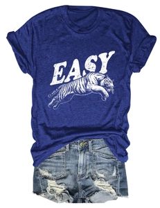 Flat lay of blue cotton tiger print T-shirt and distressed denim shorts ensemble