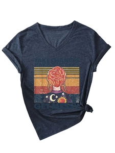 Close-up of V-neck T-shirt detail showing colorful text print and stylish hem knot